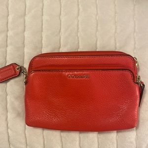 Coral/pink coach wallet